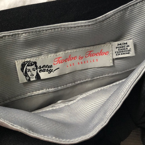 Asymmetrical miniskirt with ruffle - Picture 3 of 3